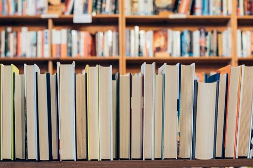 Close up of books on a shelf in a library